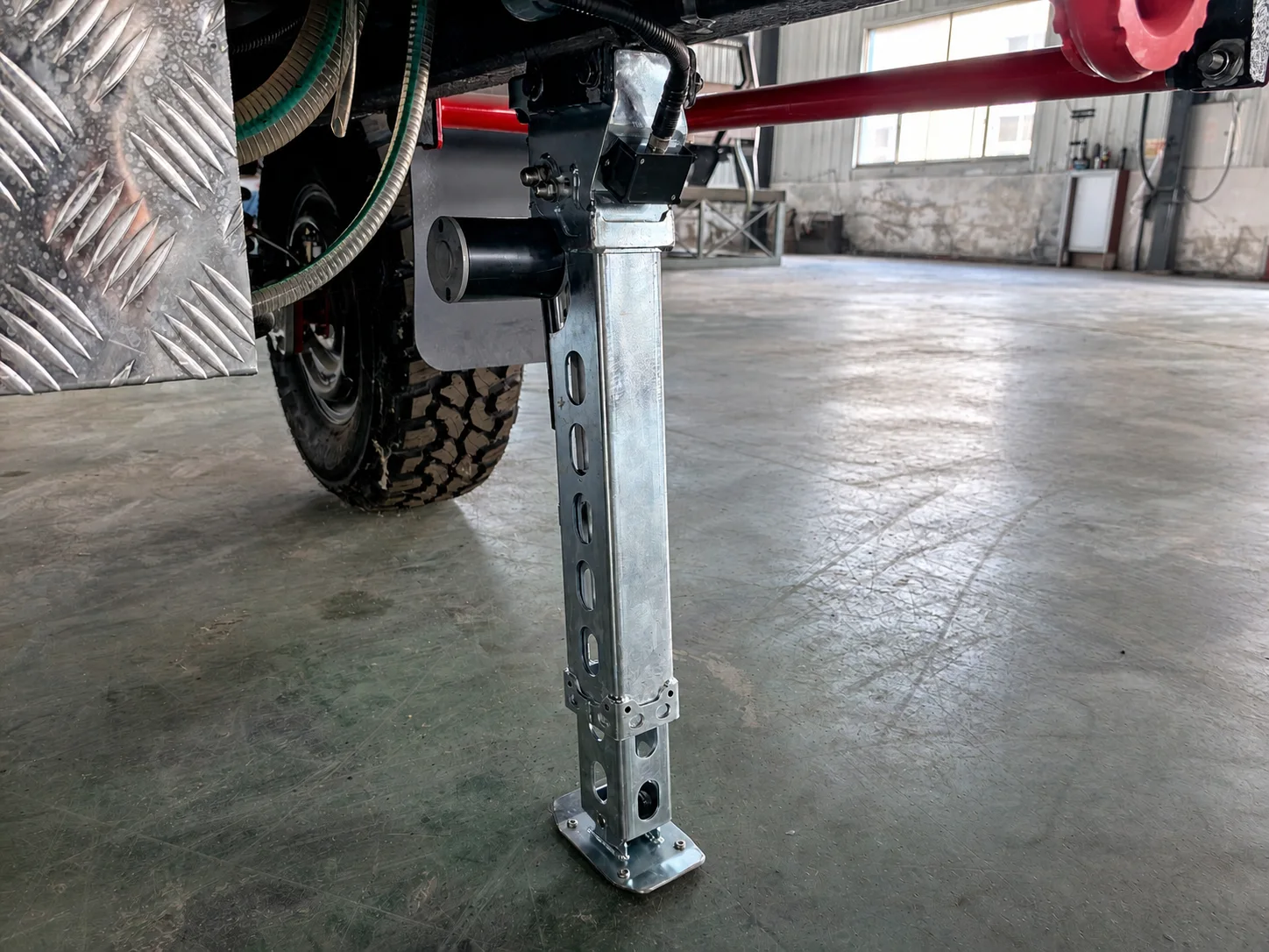 AOZI 12V Four-Leg Sensor-Based Automatic Leveling & Stabilization System — Full-length installed side view