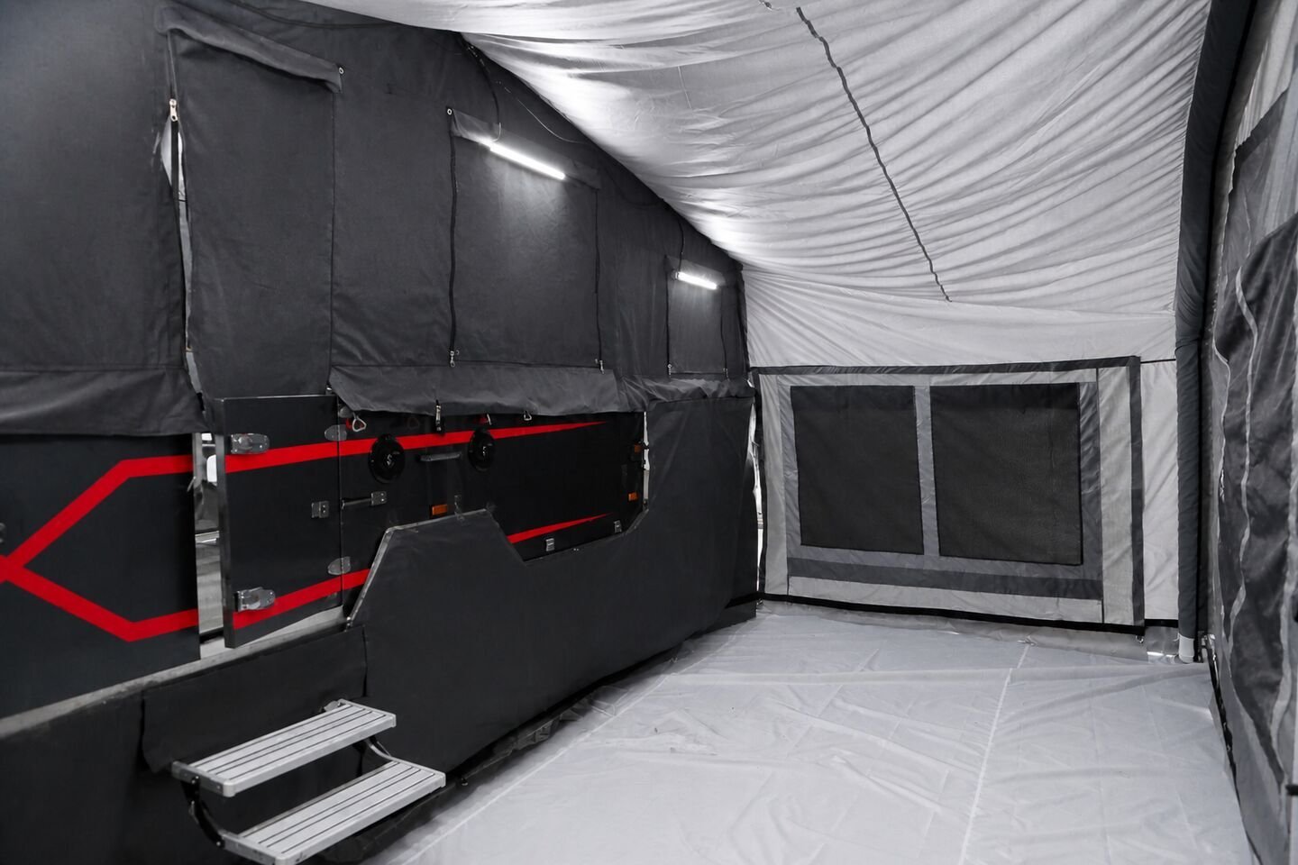 Vehicle, tent body, storage, chassis, interior and towing details 40