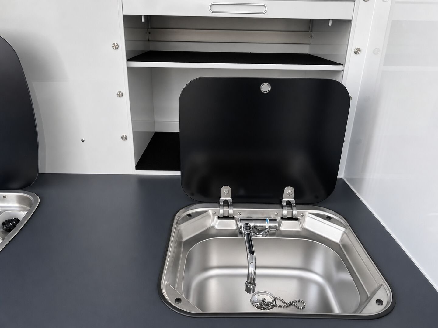 Vehicle, kitchen, storage, chassis and interior details 29